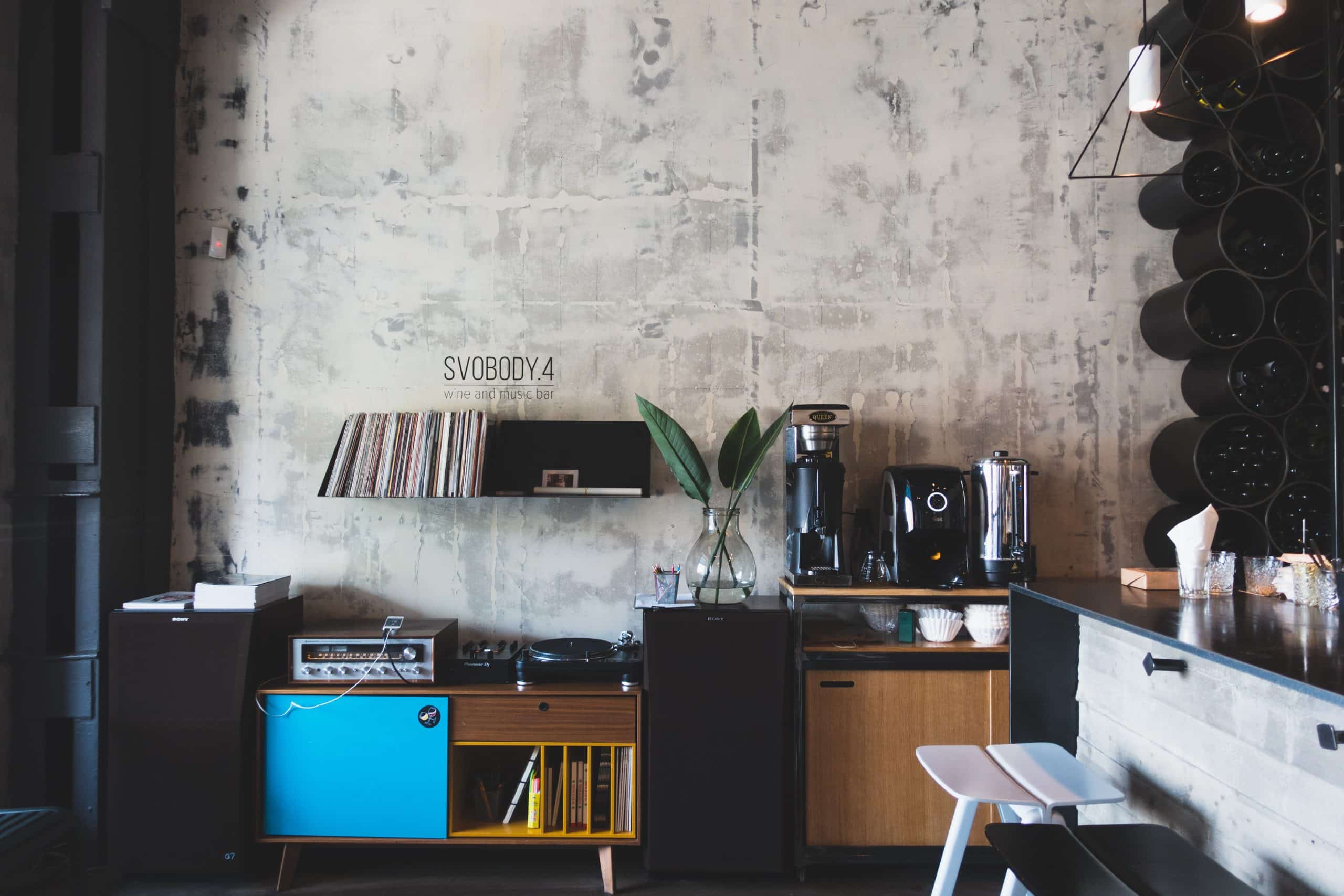 Room with a desk and table